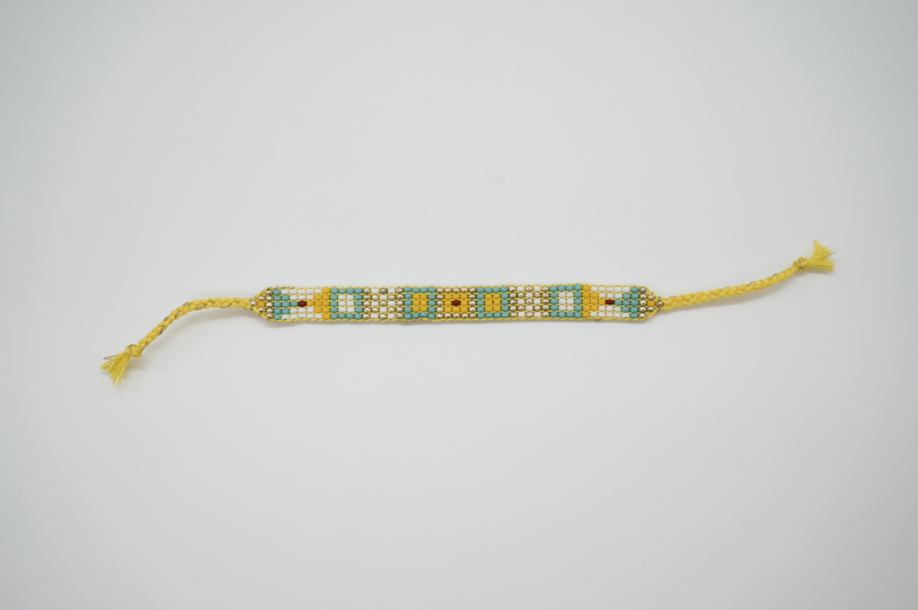Voorbeeld De pareldief armband